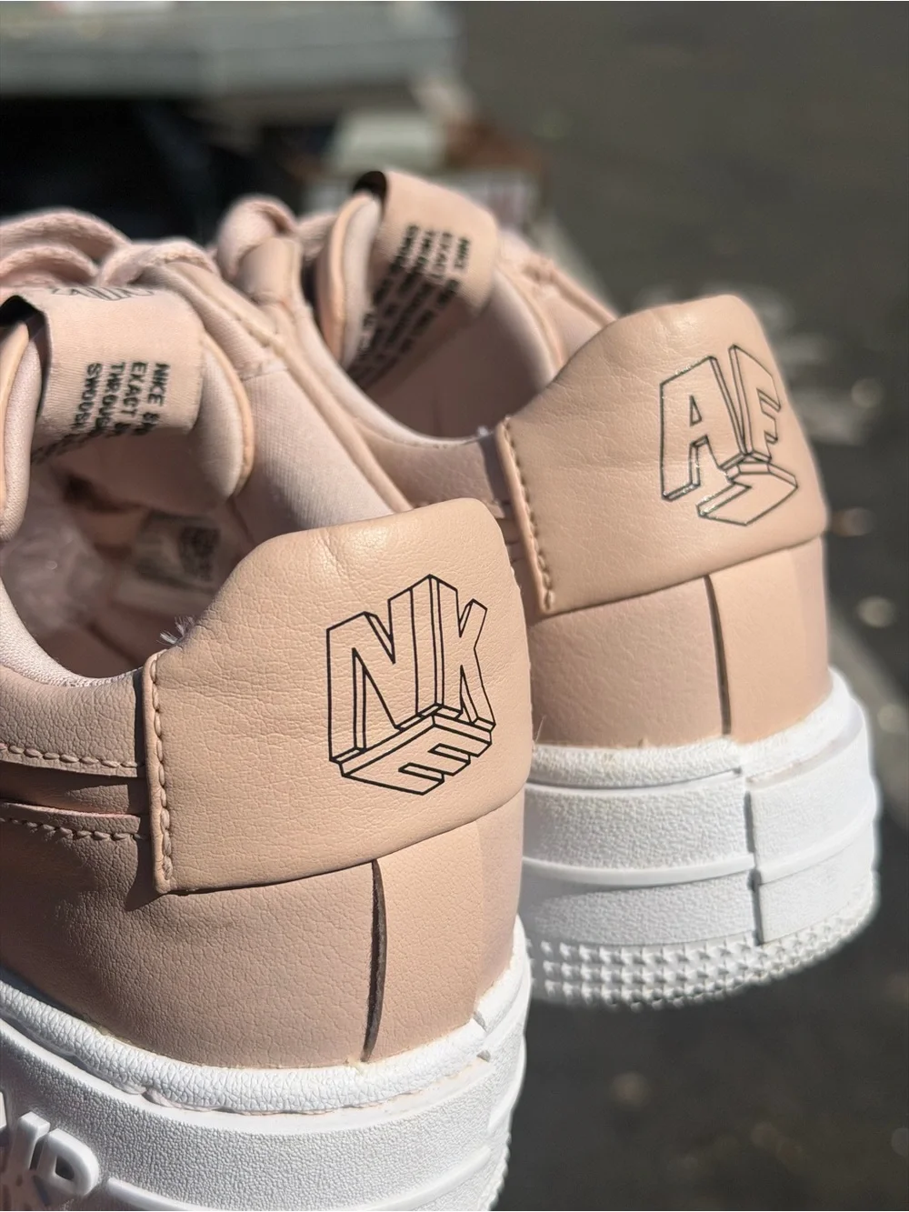 Nike Women's Blush Leather Platform Sneaker
